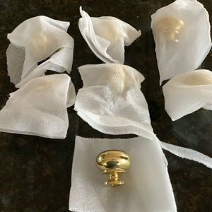 A set of six heavy brass knobs - new with tags